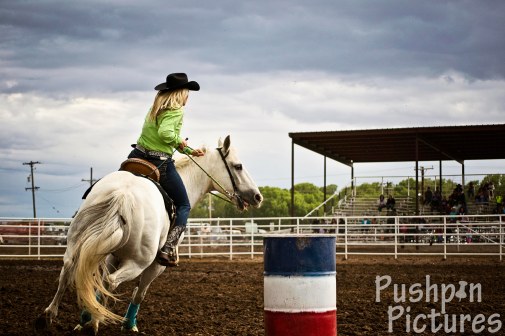 Morgan Huffaker rounds a barrel at the Manassa, Colorado, rodeo